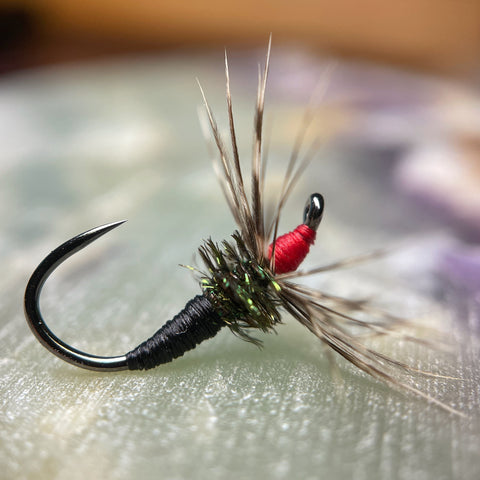 Black and red Sakasa Kebari tied on a Moonlit ML102 dry fly hook