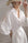 Exquisite Handcrafted White Hollow-Out Shirt Dress for Women