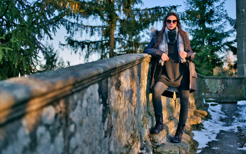 A woman in barefoot boots in the winter