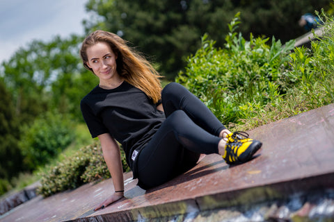 A runner in barefoot shoes.