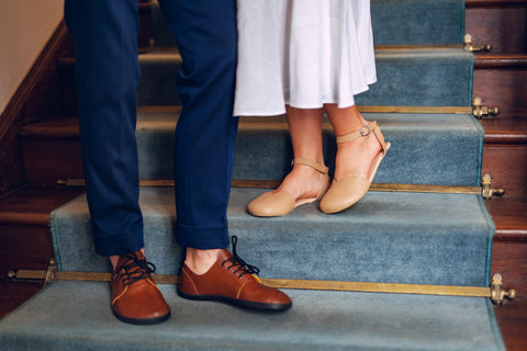 Bride and groom in barefoot wedding shoes