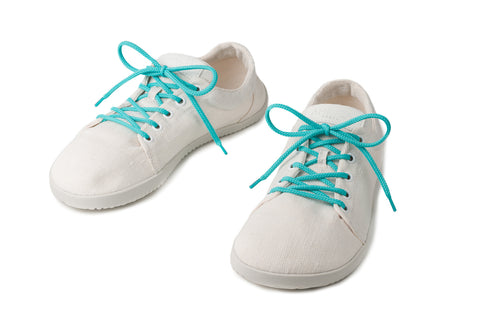 white Ahinsa sneakers with round turquoise laces