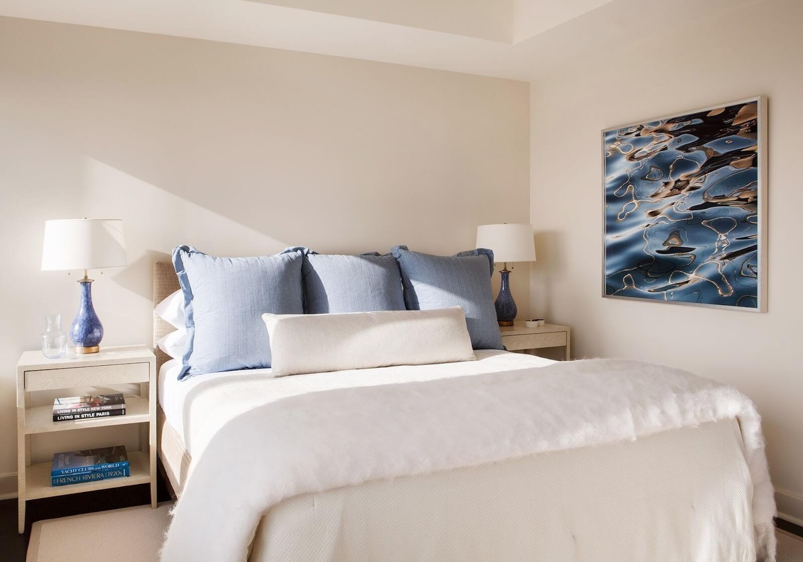 A properly organized white bedroom.