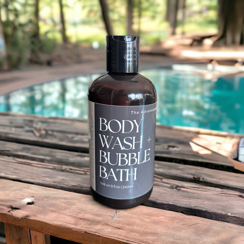 Hot Spring Body Wash and Bubble Bath sitting on wooden deck with hot spring in background