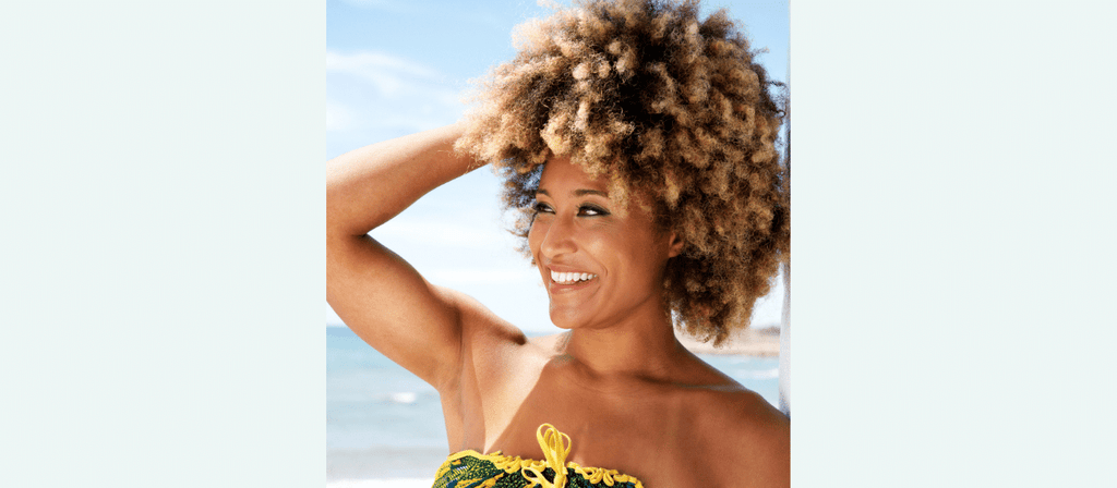 black woman with healthy trimmed curly hair