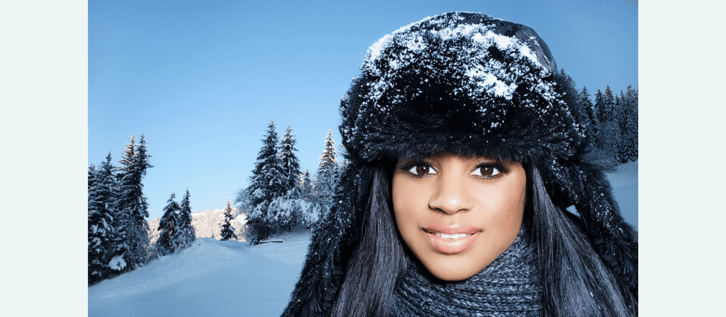 black woman with snow in natural hair