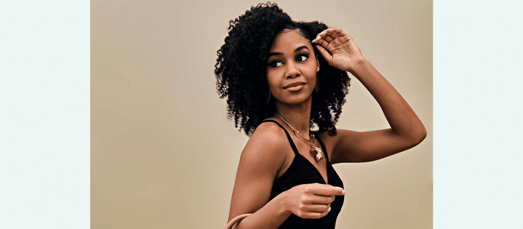 woman with natural hair done by stylist