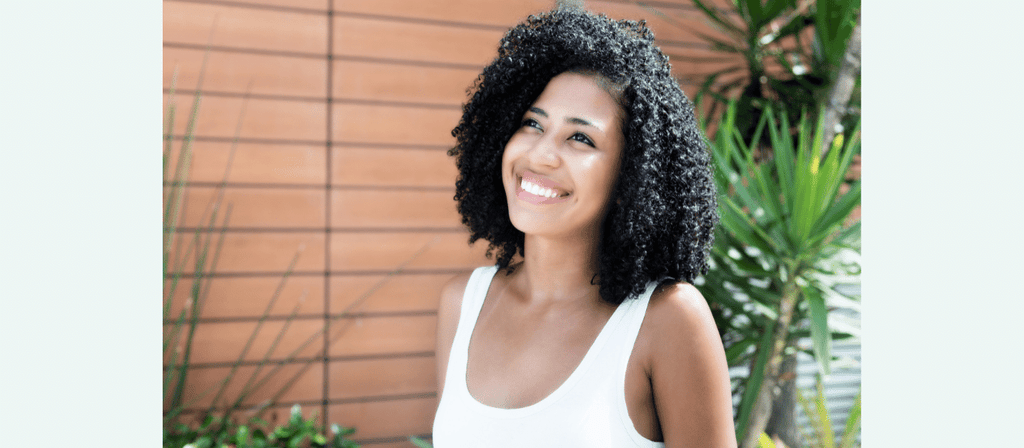 black woman trimmed small amount of hair