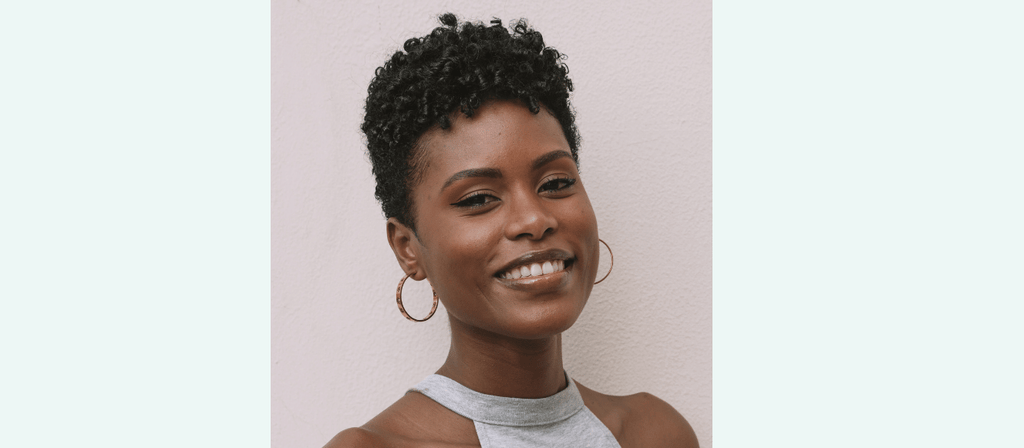 black woman after detangling matted natural hair