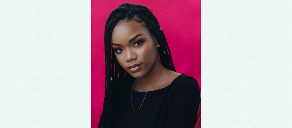 black woman with frizz in braids