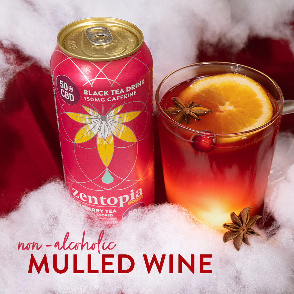 Raspberry Non-Alcoholic Mulled Wine surrounded by whole spices