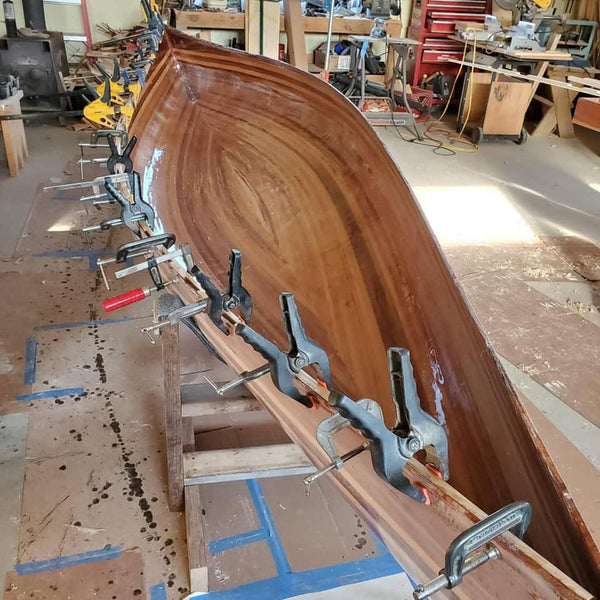 Bob's Special canoe building progress shot showing inner gunwales clamped on