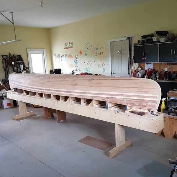 Bob's Special canoe on strongback ready to be sanded