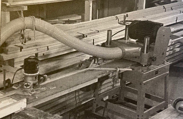 Two routers and a planer set up to shape planking