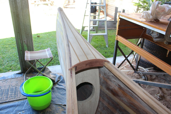 Deck detail on Champlain wooden canoe, showing bulkhead and three-part accent on deck