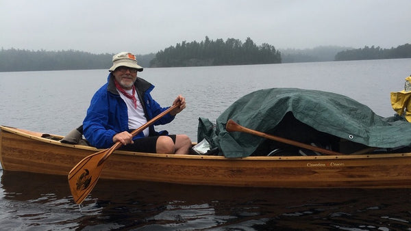 Ron Frenette paddles a wooden canoe on a trip to the Kipawa