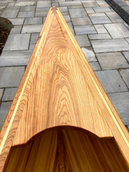 Closeup of cherry decks on a Nomad 17 canoe