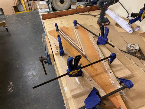 Canoe deck clamped into a jig