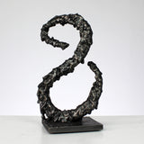 Infinito - Escultura metálica signo de acero infinito