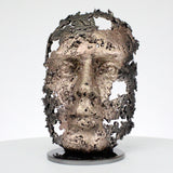 Escultura rostro de Philippe Buil encaje metal acero y bronce