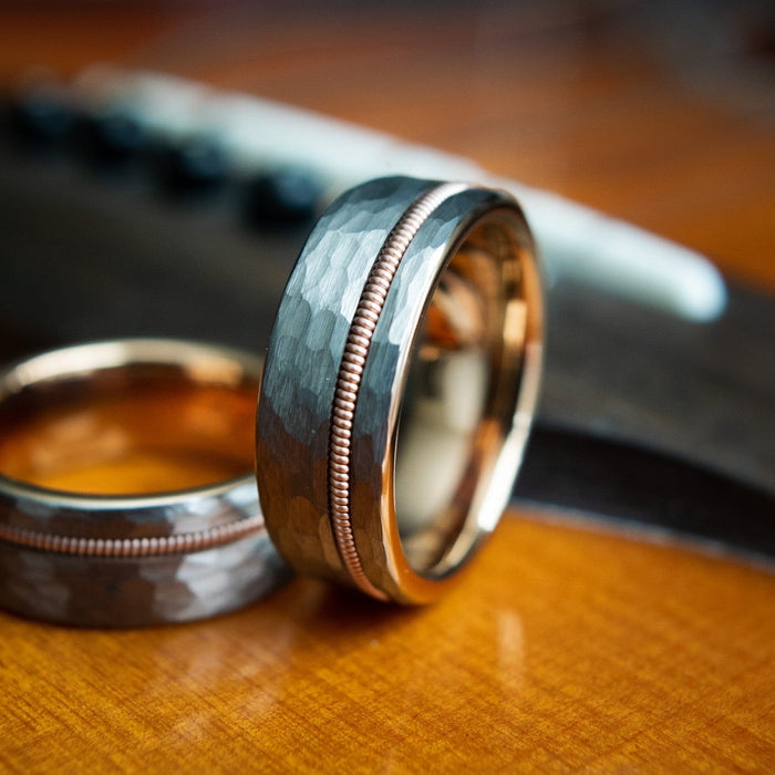 rose gold and guitar string men’s wedding band