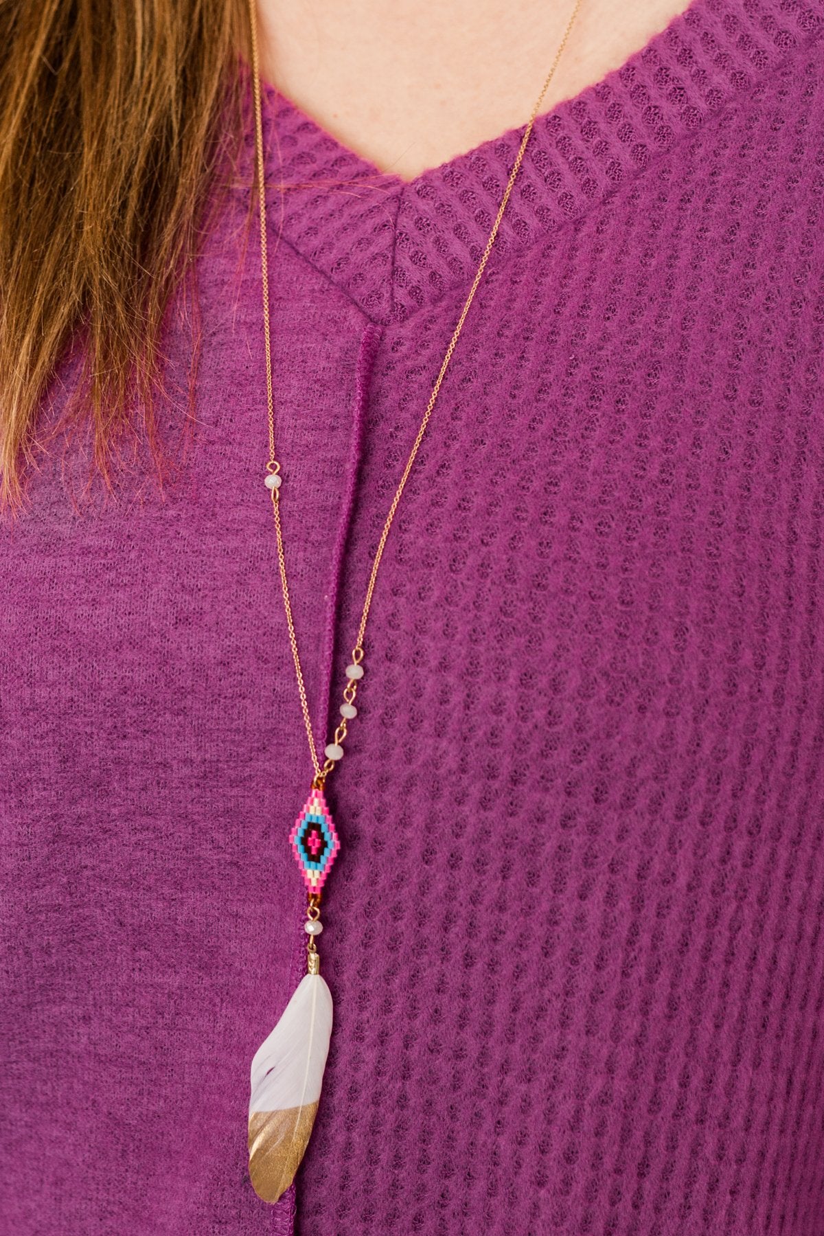 pink feather necklace