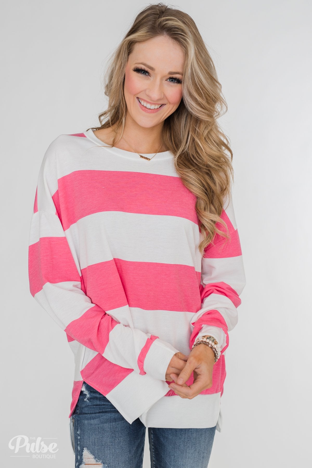 pink and white striped sweatshirt
