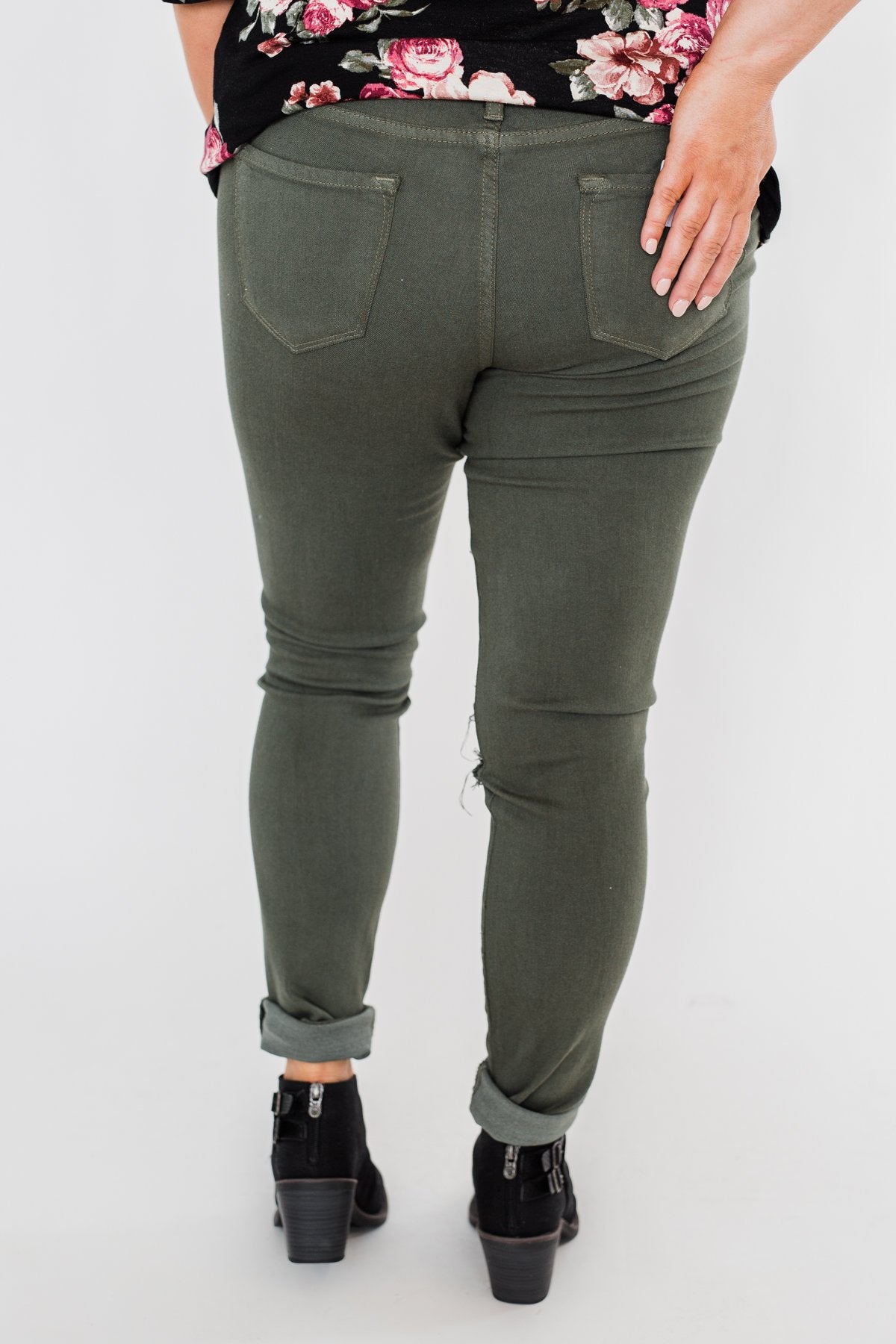 distressed olive green jeans