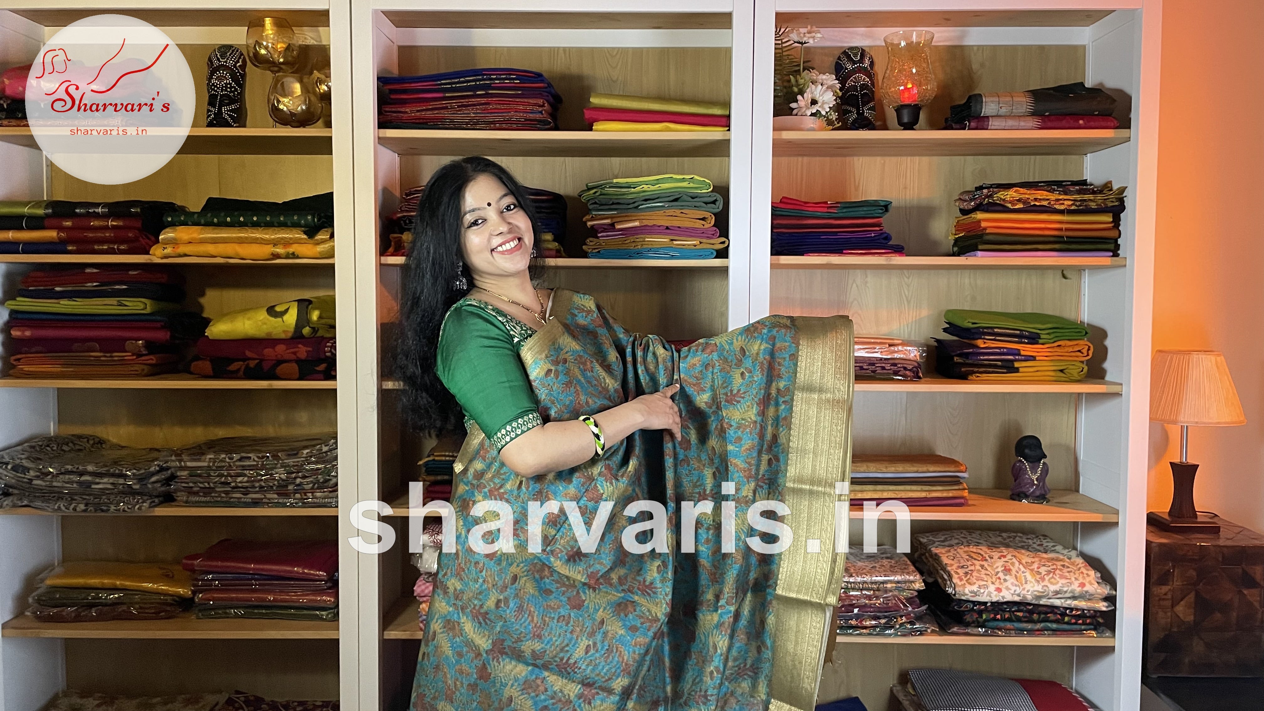 Mehendi Green Traditional Silk Saree With Copper Sulphate Blue Blouse &  Buttas Pattern - Sri Arya Silks