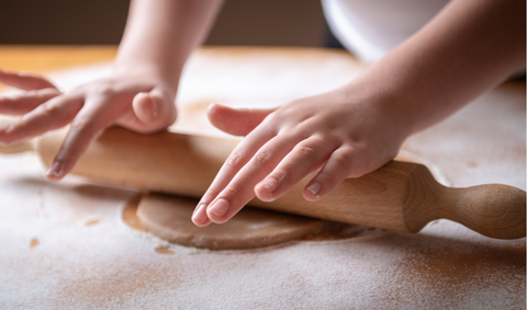 Rolling out homemade dog treats