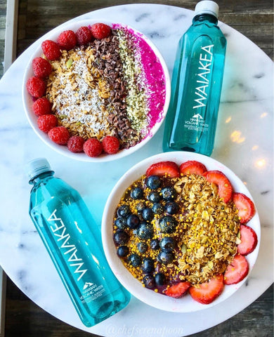 Two Waiakea water bottles and acai bowls