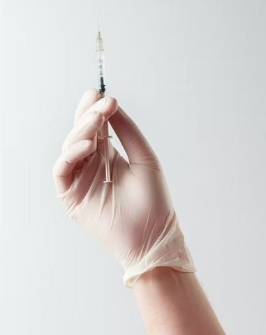 hand holding a needle photo