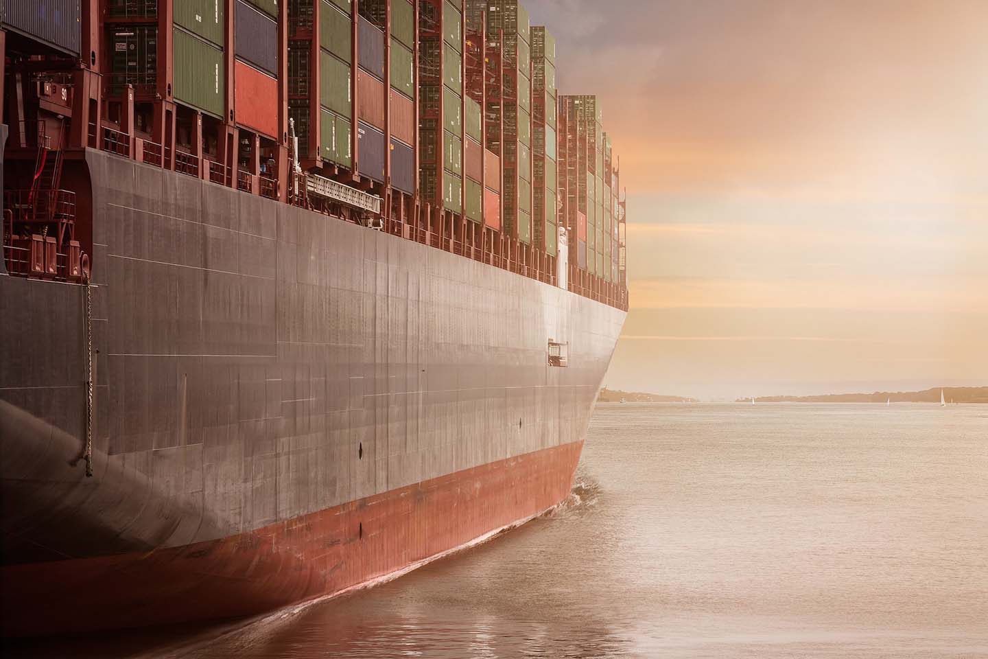 large cargo ship loaded with crates