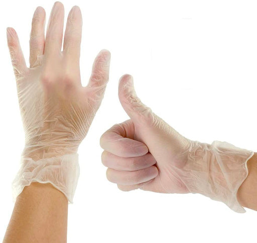Two hands wearing vinyl gloves. One hand is in a neutral, palm down position and the other is giving a thumbs up gesture.