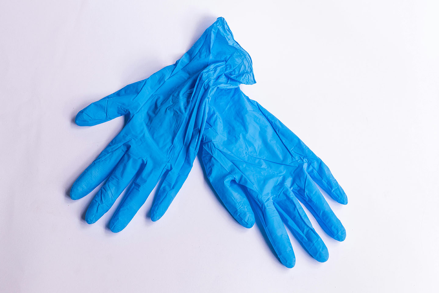 Pair of blue disposable gloves