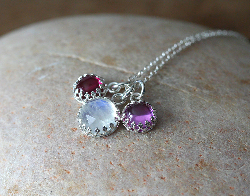 Pink sapphire, ruby, and moonstone princess crown necklaces in sustainable sterling silver. Ethical. Handmade in New Jersey, US.