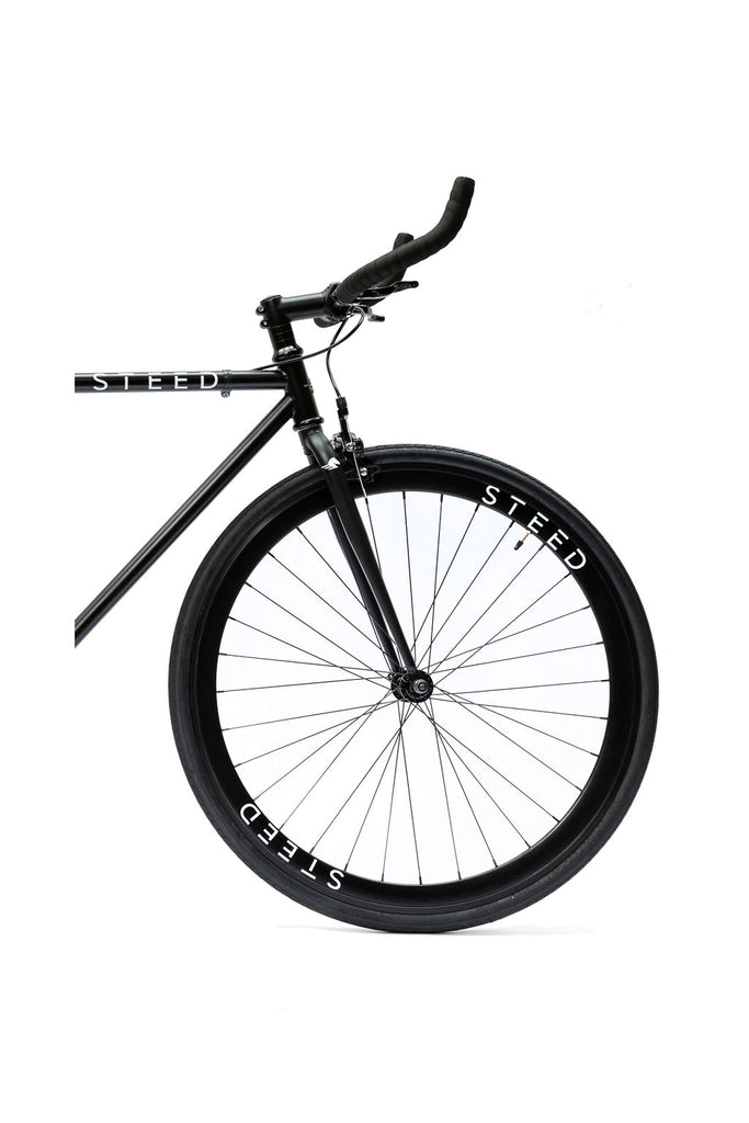 front wheel of black single speed Steed Bike Stallion