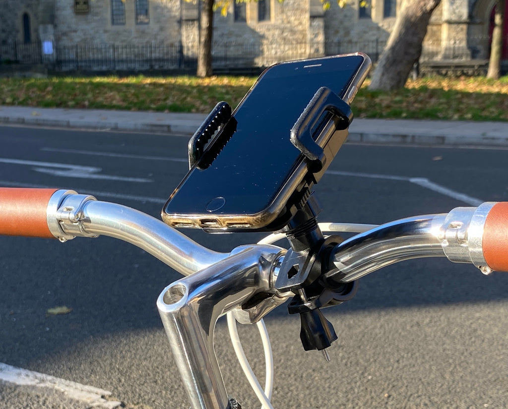 Close up of universal mobile phone holder on bicycle Steed Bike