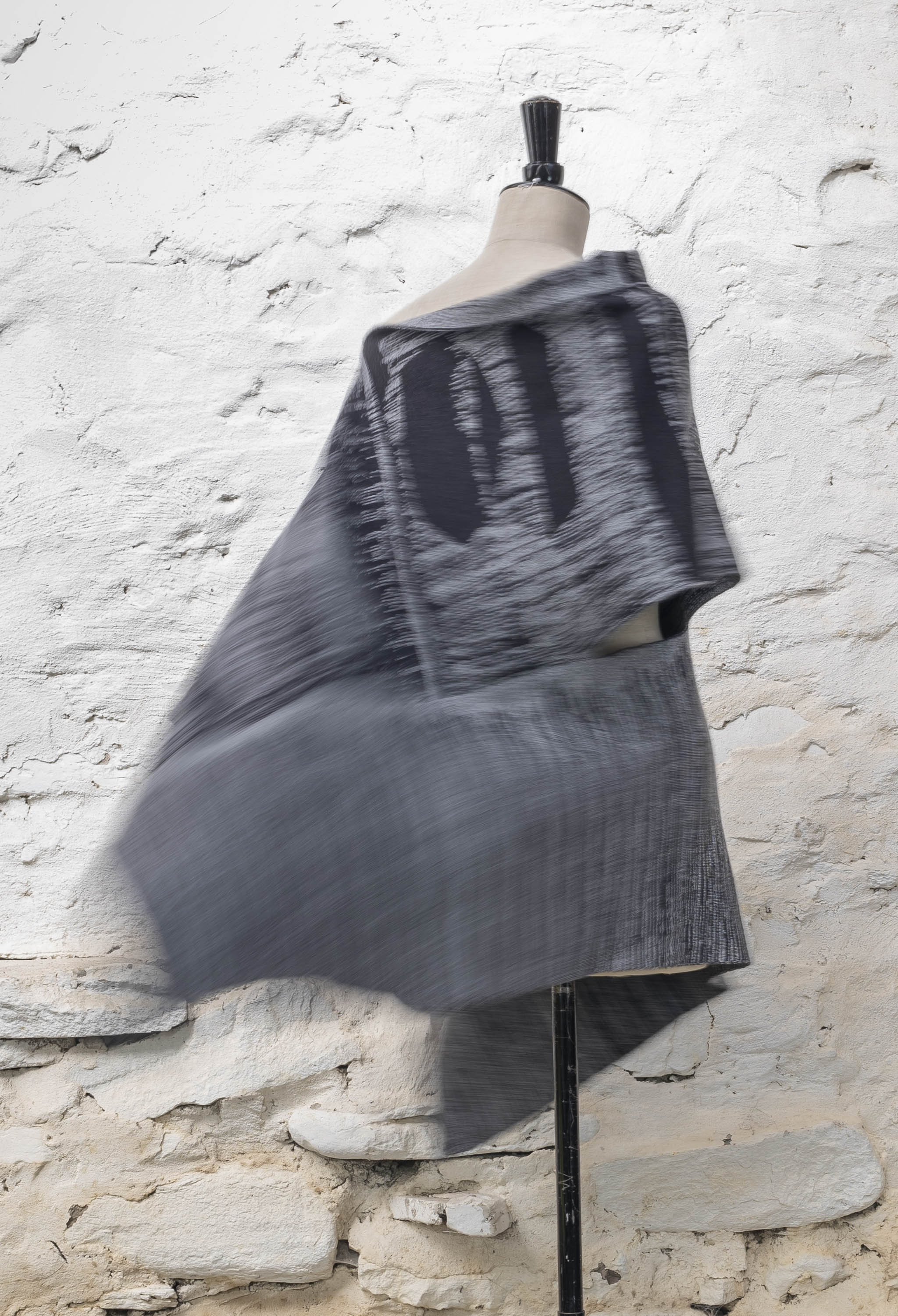 Inklines cape in greys, with abstract linear patterning