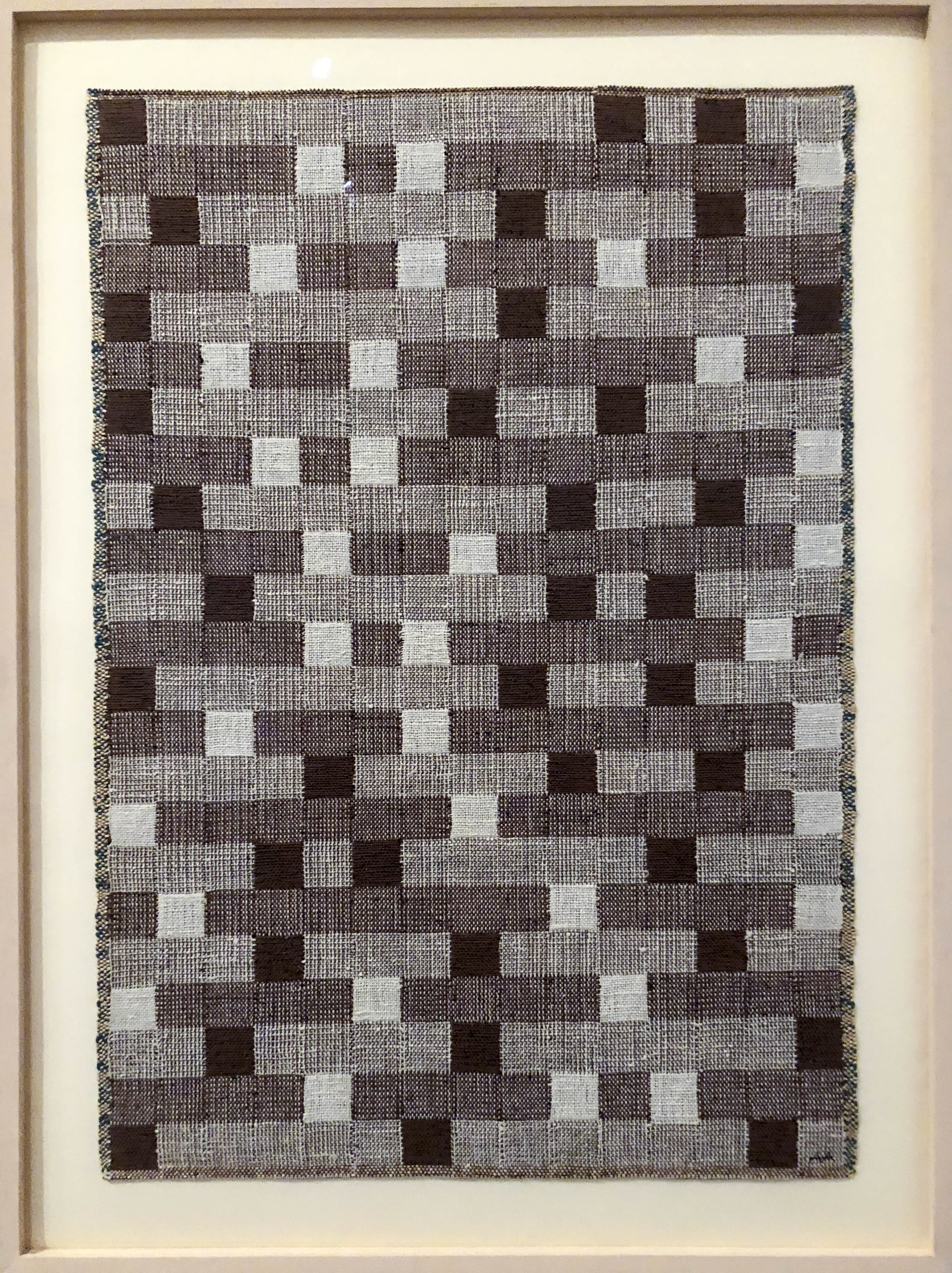 Anni Albers woven panel as seen at Tate. Black and white yarn gives linear but irregular placement of squares and rectangles