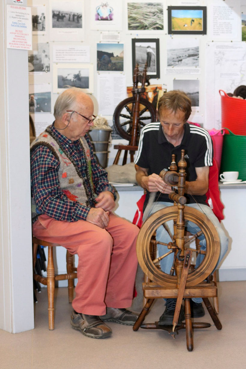 Men handspinning wool, Hoswick, Shetland