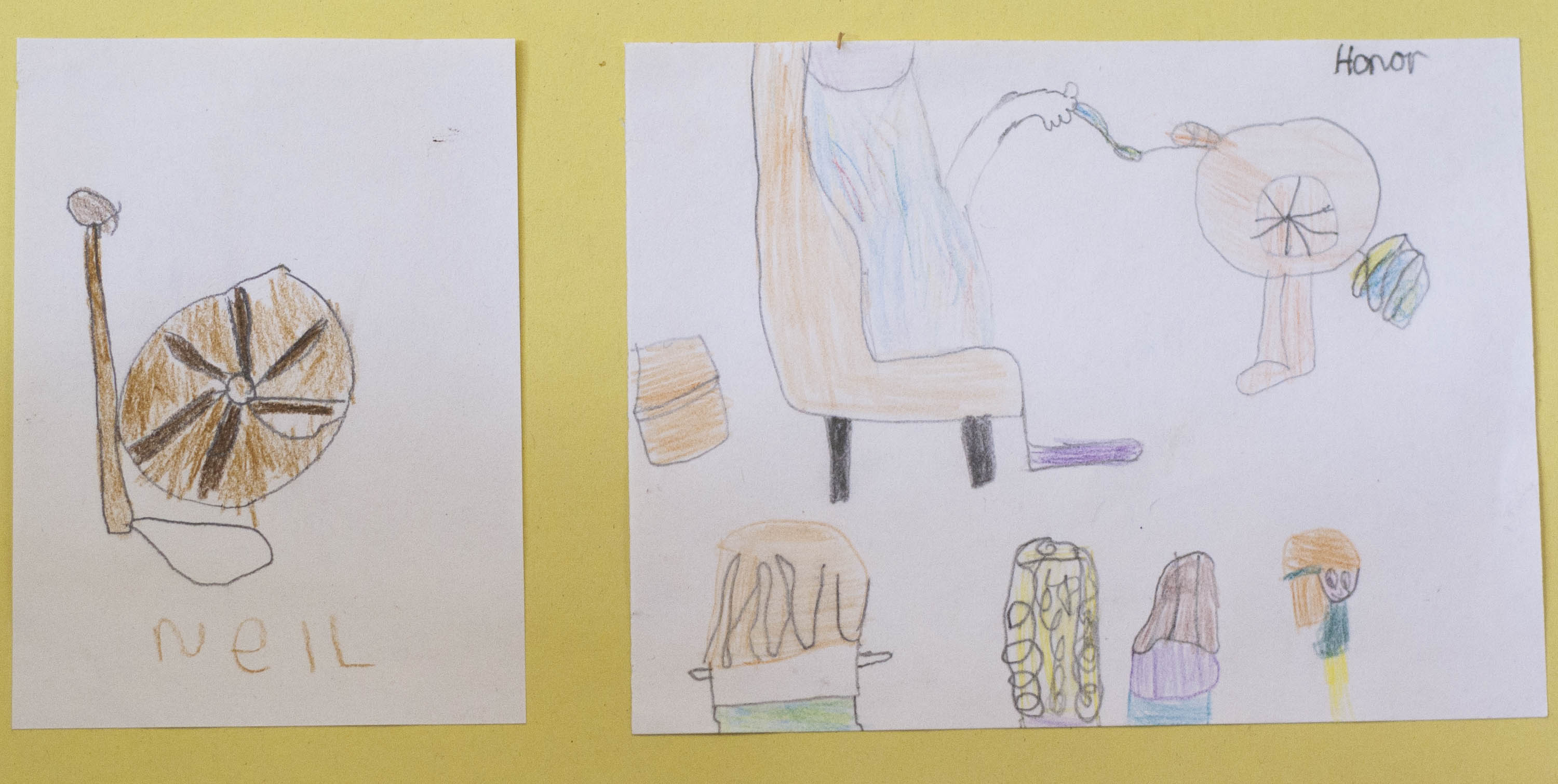 Children's drawings of a spinning wheel and a demonstration of a spinning wheel