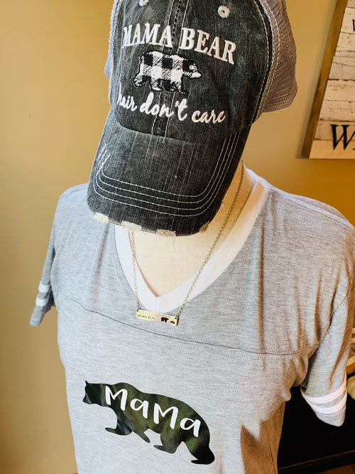 Hats, shirts, necklaces { Mama bear hair don't care. Gray with black and white buffalo plaid bear. Embroidered. Necklaces silver with option of bears. T-shirts XS - XL.