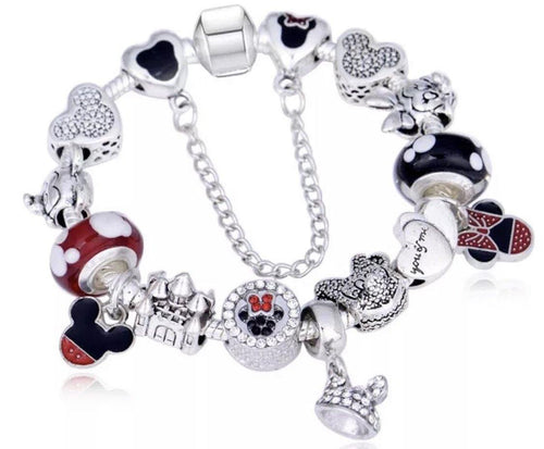Bracelet { Mickey Mouse } Bracelet { Minney Mouse } Bow. Silver. Red. Dots. Hearts. Mickey Mouse. Glass beads. Safety chain. Assorted sizes. Search Mickey Mouse and Minnie Mouse for other items! FREE ship in USA! Pandora style.