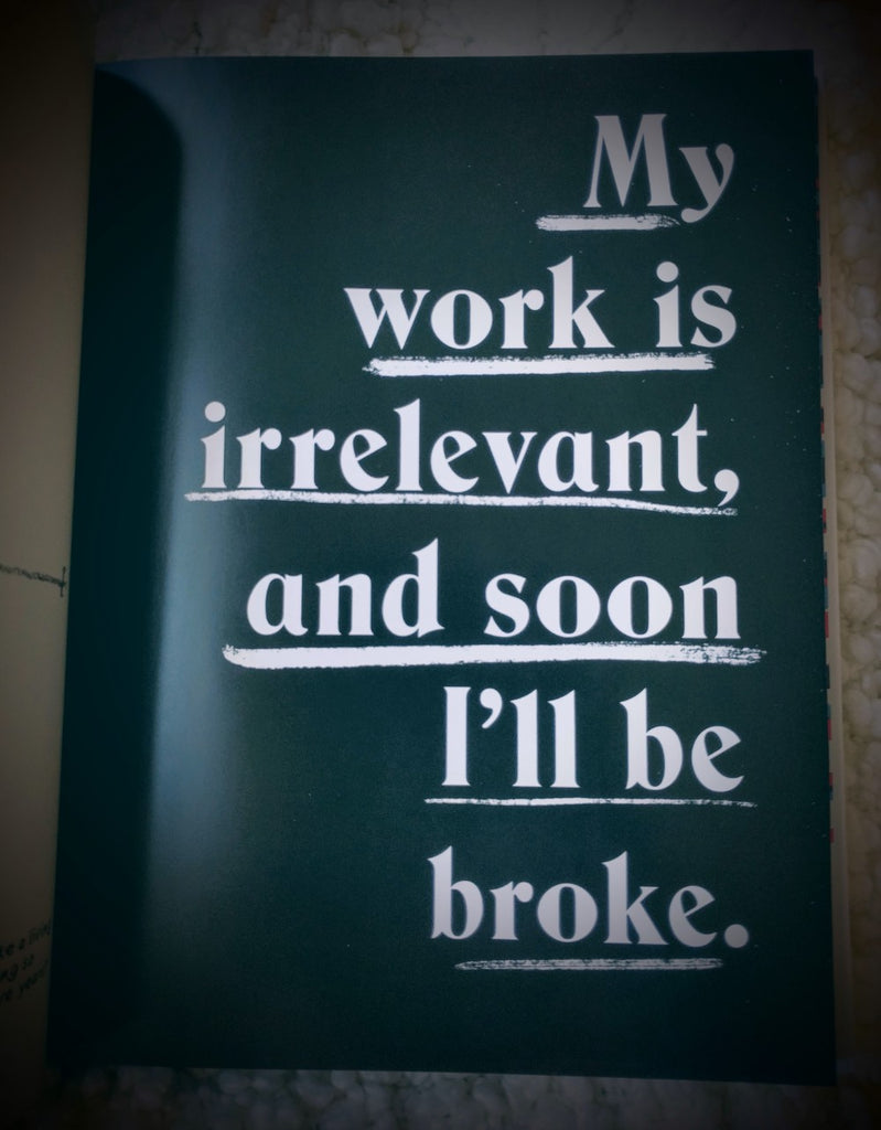 Image of a page in a book that reads "My work is irrelevant and soon I'll be broke"