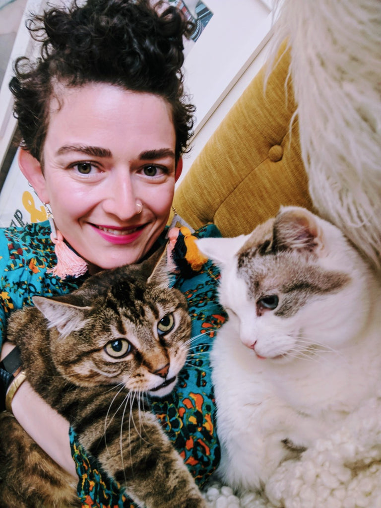 Adrianne with her two cats