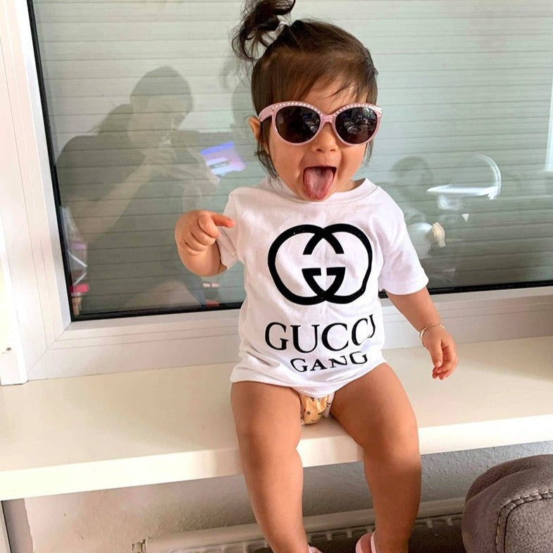 babies wearing gucci