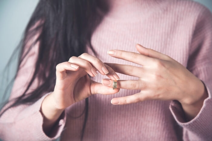 Woman-with-Slim-Fingers-Wearing-a-Ring