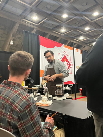 explaining coffee at the brewers cup