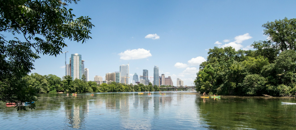 austin skyline during the day seeing downtown and kayaks
